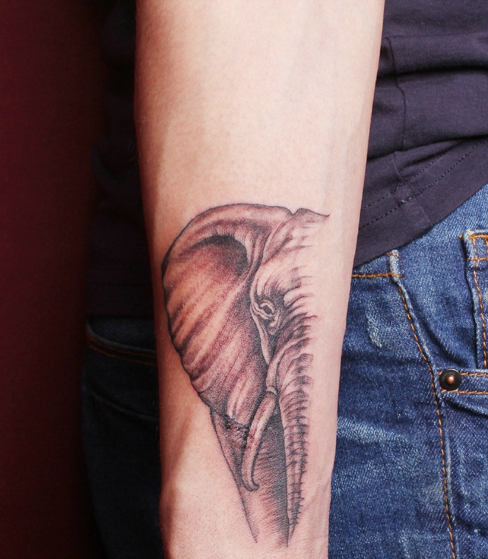 点击大图看下一张：手臂创意半天小象神纹身图案