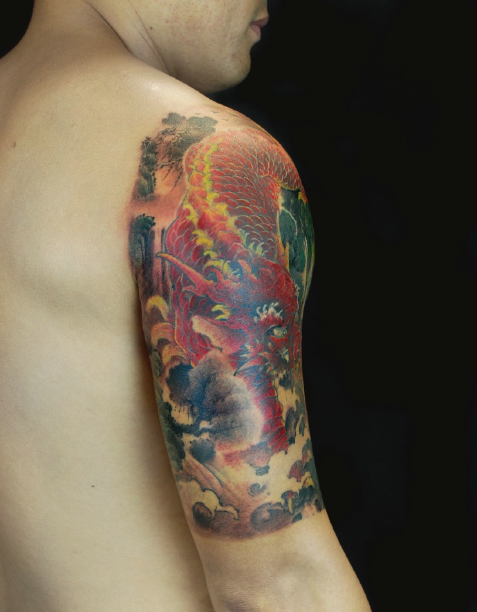 点击大图看下一张：花臂经典老传统火麒麟纹身图案
