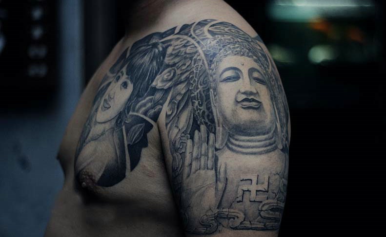 点击大图看下一张：美女与佛祖结合的半甲纹身图案