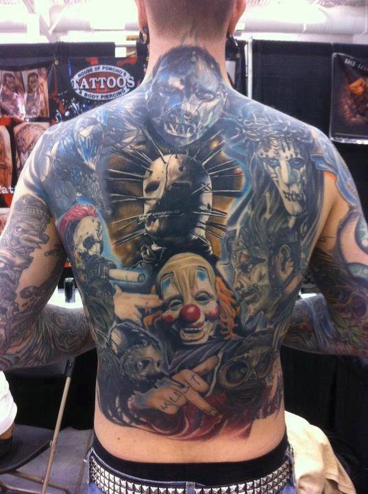 点击大图看下一张：狂野夸张的满背另类图腾纹身刺青