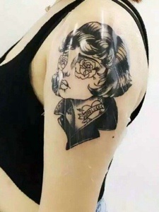 另类女孩手臂一款另类女孩纹身图案