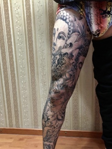 莲花与佛像结合的花臂纹身图案