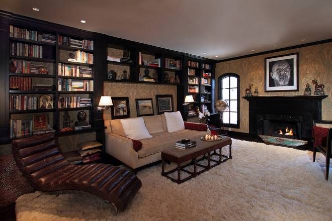 点击大图看下一张：背景墙沙发单人沙发书架装修图