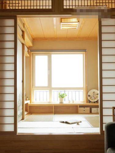 点击大图看下一张：日式阳台榻榻米植物桌子装饰品设计案例